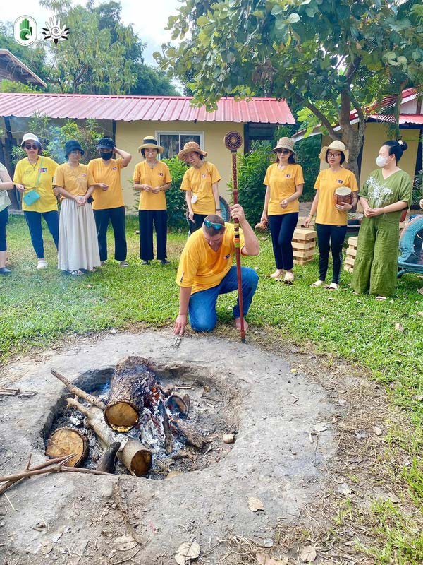 Gathered around the fire circle at a previous Fire Gathering